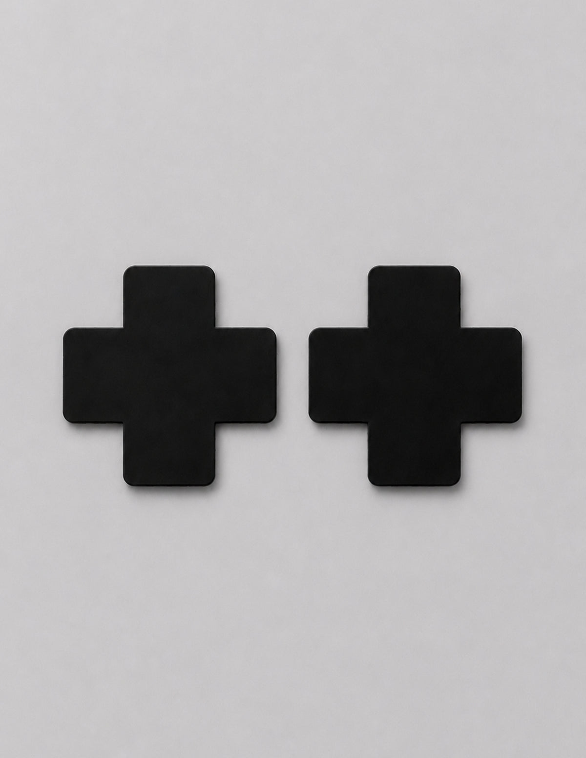 Nippel Cover Kreuz schwarz oder lila